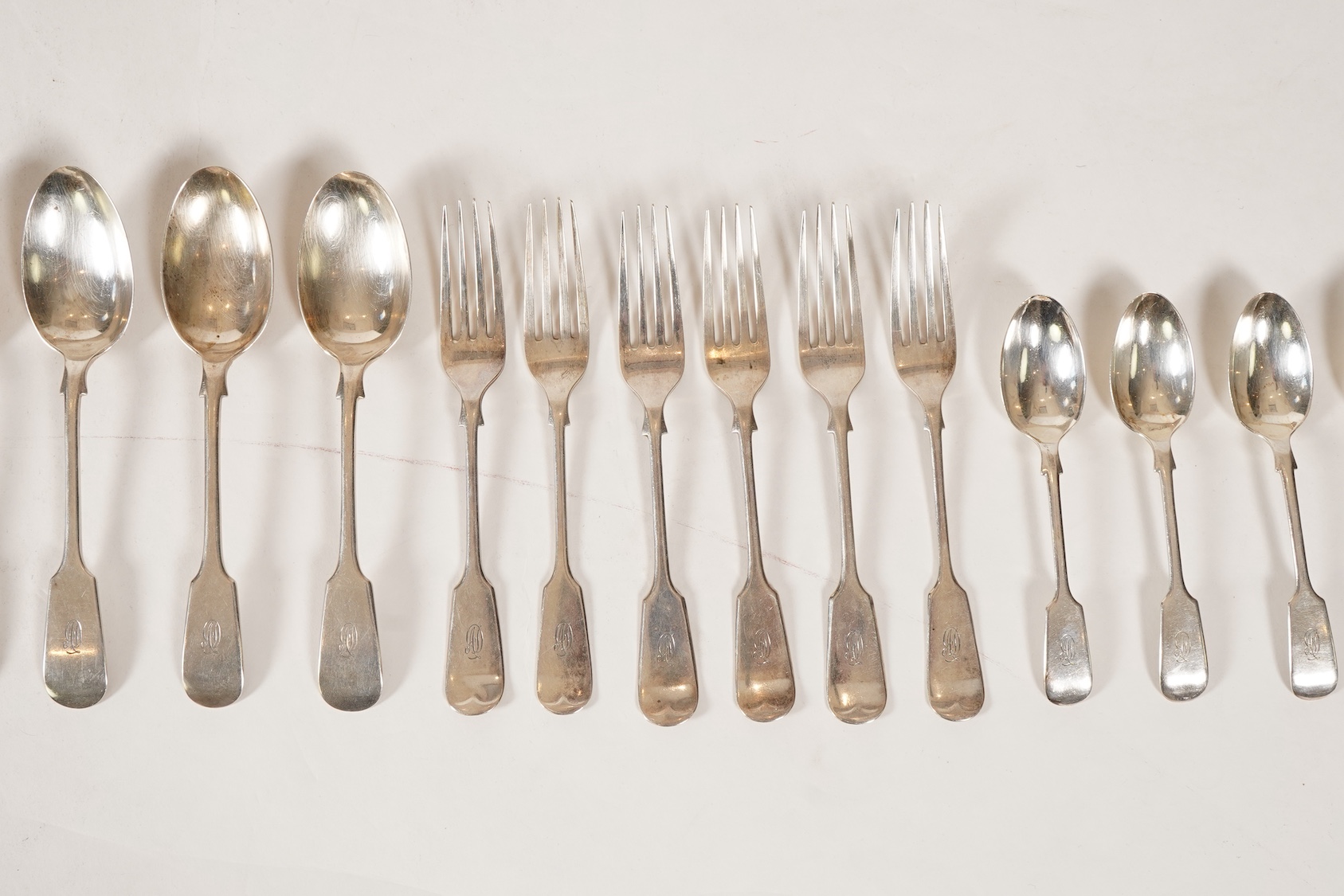 A George V silver part canteen of fiddle pattern flatware by John Round